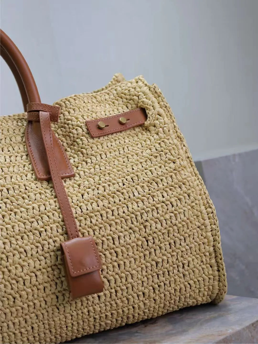 Natural Beige Woven Multi-Wear Travel Bag with Brown Leather Hardware