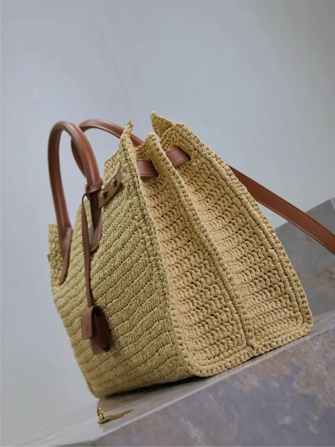 Natural Beige Woven Multi-Wear Travel Bag with Brown Leather Hardware
